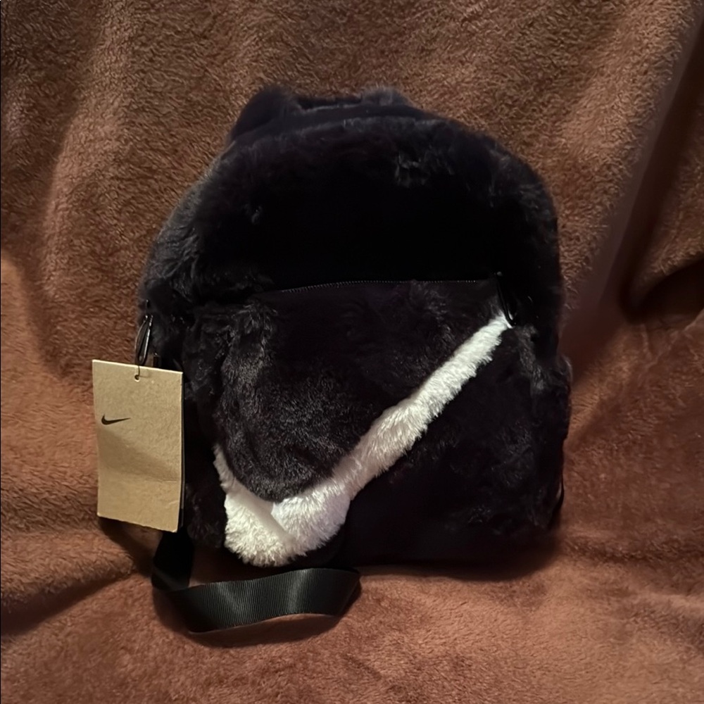Nike Faux Fur Backpack in Black and White